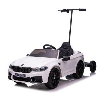 China Four Wheels With Suspension 2021Licensed M5 BMW Drift 24v Powerwheel Kids Cars Battery Ride On Electric Car Toys With Push Handle for sale