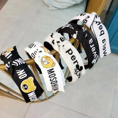 China Korean version of new bear cartoon fashionable cloth headband art letter hairpin hair band for sale