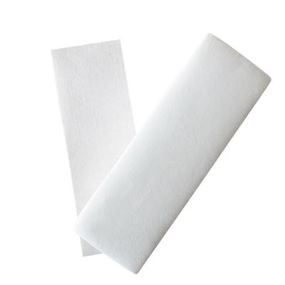 China Soft Surface Wax Strip Rolls Waxed Paper Strip Waxing Nonwoven Strips Paper Wholesale Nonwoven Depilatory Paper Body And Facial Depilatory for sale