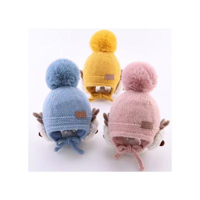 China Manufacturer Casual Provides Kids Acrylic Knitted Hat Fleece Lining Winter Ear Flap Hat for sale