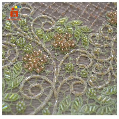 China Viable New Designs HLSD175 Wholesale Sequin Tulle Embroidery Flowers Beaded Lace Fabric Embroidery for sale