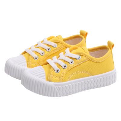 China Wholesale Flat Cheap Autumn Kids Board Shoes Solid Color Spring Boy Girl Rubber Casual Canvas Shoes for sale