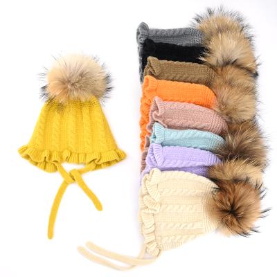 China KAZUFUR Raccoon Fur Pom Poms Knitted Hats For Kids Baby Boys Beanie Hat With Fur Ball Top for sale