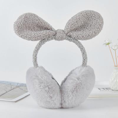 China Keeping Warm Fashion KAZUFUR Girls Fashion Large Bowknot Earmuffs Winter Fashion Earmuffs for sale