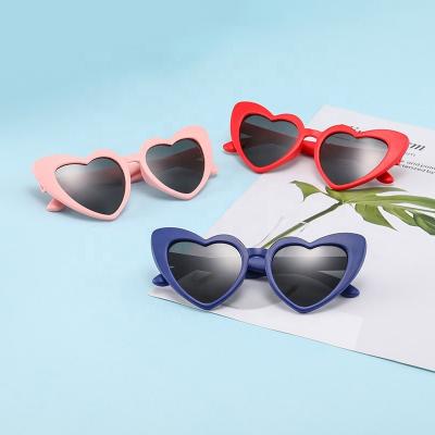 China Fashion Sunglasses New Yuxun Candy Color Shaped Uv400 Fashion Colorful Children Small Girl Children Love Heart Sunglasses 2022 for sale