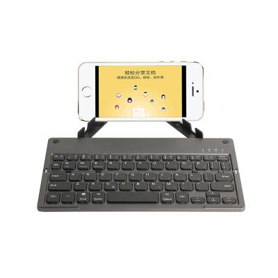 China Ultra Thin Slim Folding Mini Keyboard BT Portable Foldable Wireless Keyboard with Mouse Touchpad for Android Laptop PC for sale