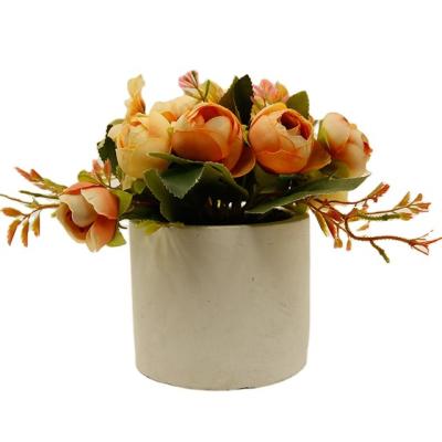 China PE Artificial flowers in concrete pot modern home decor Faux potted Greenery for sale