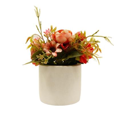 China PE Artificial flowers in concrete pot modern home decor Faux potted Greenery for sale