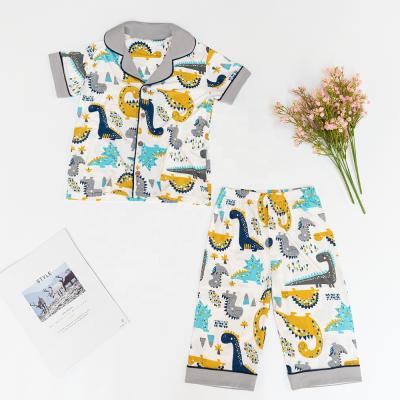 China Breathable New Summer Cotton Children's Pajamas Suit Short Sleeve Cartoon Dinosaur Pajamas Suit for sale