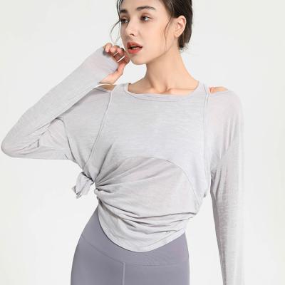 China Breathable Sports Yoga Shirts Women Irregular T Shirts Loose Long Sleeve Top for sale