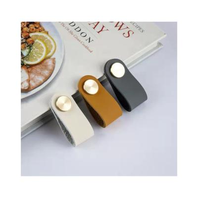 China Modern Hot Sale Wardrobe Brass Studs Knobs PU Leather Drawer Handle Pull for sale