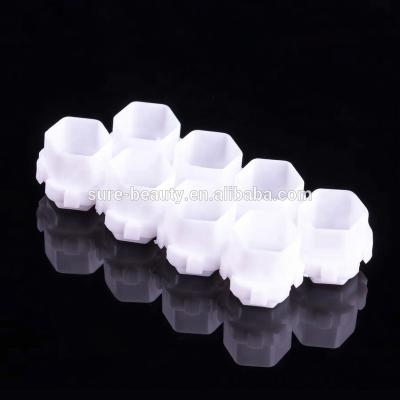 China Professional Flexible DIY Hive Ink Cup Honeycomb Shape Tattoo Ink Cup Caps For Tattoo Accessories for sale