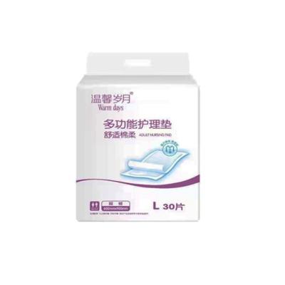 China Custom high quality white diaper adult care pads plain weave for old man for sale