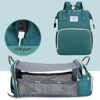 China crib & Multifunctional USB Port Travel Mum Bag and Convertible Hutch and Maternity Baby Changing Diaper Bags Diaper Bags Bed with USB Port for sale