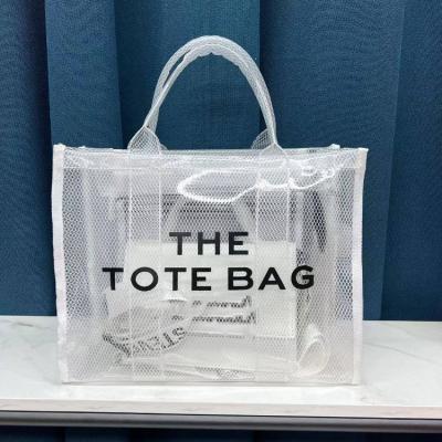 China Fashion Designer Famous Brands Large Size Plastic Colored Transparent PVC Purses And Handbags Clear Tote Bag for sale