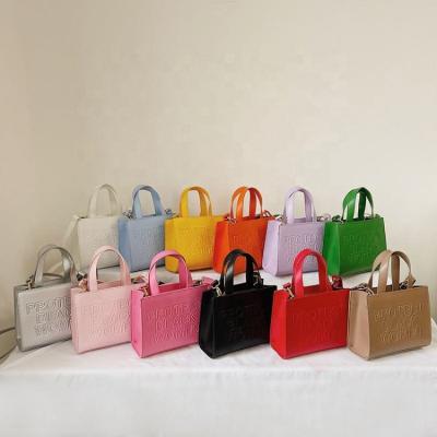 China Other Designer 2023 Handbags Famous Brands Mini Ladies Tote Hand Bags Protect Color Women's Purses and Handbags for Women Luxury for sale