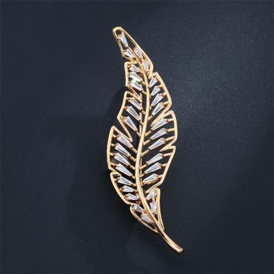 China Hot selling Korean ALLOY sheet design copper plated real gold brooch coat accessories micro inlaid shiny zircon jewelry for sale