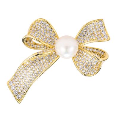 China ALLOY New Arrival Boutique Jewelry Sparkly Cute Cubic Zirconia Bow Pearl Zircon Brooch Pin Inlaid Brooch Pin for sale