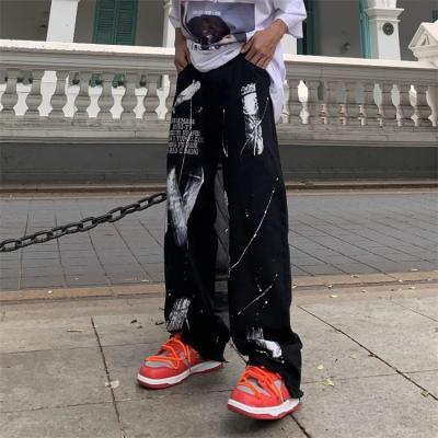 China Breathable Straight Workshop Harajuku Hip Hop Pants Graffiti Letters Ink Splatter Print Street Gothic Jeans Loose Trousers Straight for sale