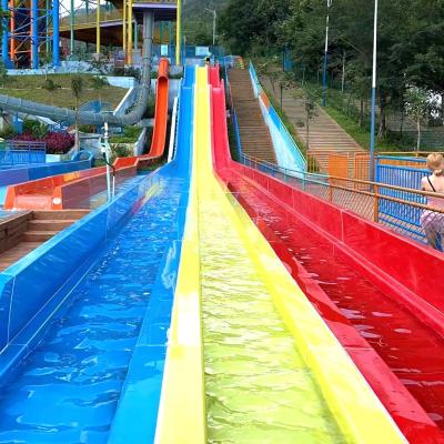 China Multi Lane Racing Water Slide For Aqua Water Park With Rainbow Colors for sale