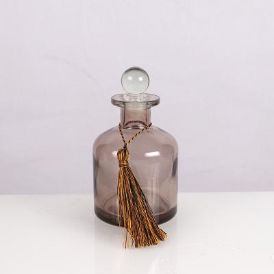 China Decorative Personal Care Aromatherapy 200ml Bottle Round Shaped Clear Reed Diffuser Glass Bottle With Cap for sale