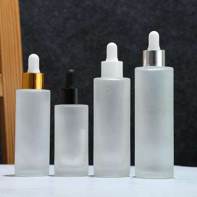 China Luxury woody essentical personal care oil cosmetics packaging glass bottle container jar witn cream dropper for sale