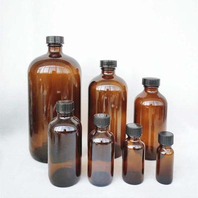 China Luxury Empty Amber Pharmaceutical Oil Bottle Personal Care Wholesale Glass Bottle Glass Essential Oil Bottles for sale