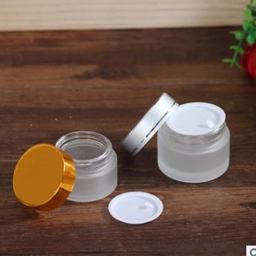 China Factory Direct Selling Luxury Custom Empty Cosmetic Cream Cylinder Personal Care Glass Packaging Jars Airtight Cosmetic Jar for sale