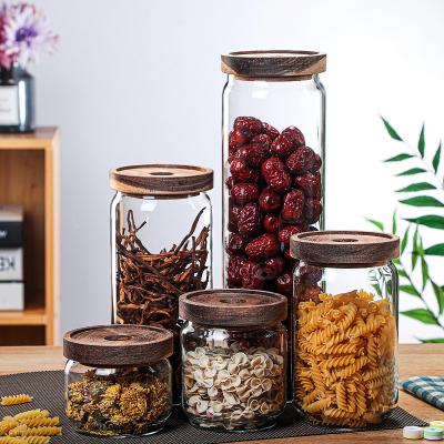 China Supplier High Quality Borosilicate Glass Jars Kitchen Food Sustainable Premium Glass Storage Container Canister With Wooden Lids for sale