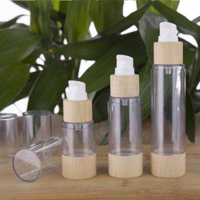 China Custom Bamboo Wood Cosmetic Packaging Bottle Plastic Bottle With Bamboo Pump for sale