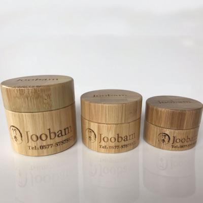 China Custom Cosmetic Bamboo Wooden Cosmetic Packaging Face Creame Jars Containers Plastic Bottle With Bamboo Lid for sale