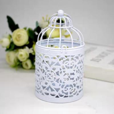 China Hot Selling Birdcage Home Decoration Luxury White Shape Candle Holder Creative Home Decoration With Hollow Pattern for sale