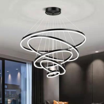 China Kingtoro Modern Simple Decorative Ceiling Hanging Pendant Light For Living Room Acrylic Circle Chandelier for sale