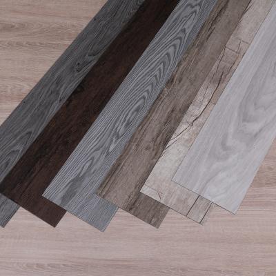 China Best luxury self-adhesive vinyl tiles anti slip pvc carpet that looks like wood planks flooring for sale