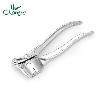 China Viable Stainless Steel Alloy Garlic Press Squeeze Tool Fruit and Vegetable Tools Cooking Kitchen Accessories for sale