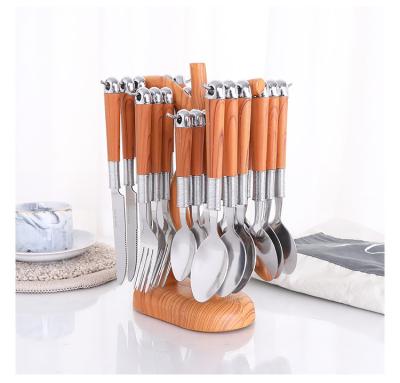 China Durable Wooden Handle Stainless Steel Flatware Set Knife Fork Spoon 24 Piece Portable Cutlery Set With Cutlery Rack for sale