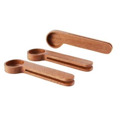 China Customized sustainable logo 100% natural sapele wood teaspoon with clip, wooden measuring spoon for sale