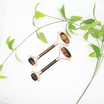 China China jade tiger eye roller double headed jade roller face roller crystal handheld massage stick for sale