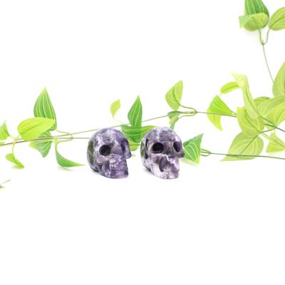 China Wholesale Europe Skull Shaped Natural Crystal Stone Gemstones Amethyst Crystal Skull Dream Carvings for sale