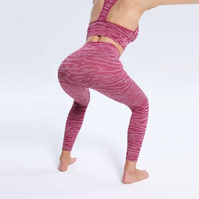 China Anti-static Seamless Striped Yoga Stretch Fitness Gaiters Gym Running Pants for sale