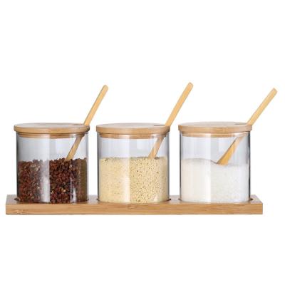 China Sustainable Glass Coffee Storage Container For Flavoring With Wooden Spoon And Lid for sale