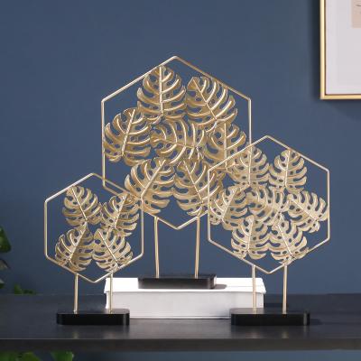 China Nordic Traditional Home Furnishing Gold Foil Wrought Iron Living Room Ornaments Decoration Sculpture Office Desktop Decoration for sale