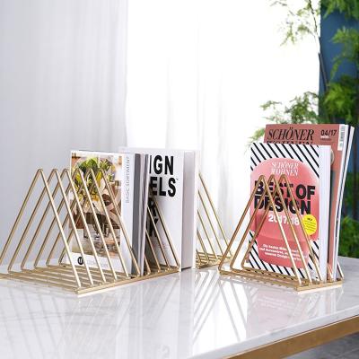 China Morden moutain shape triangle shelf modern design gold iron metal geometric bookends for magazine storag decorative for sale