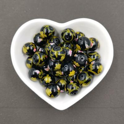 China Crystal Glass Bead Wholesaler 12mm Black Leaf Hand Painted Glass Bead For Necklace Making Beads for sale