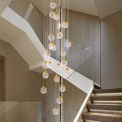 China Modern Design Crystal Chandelier Hotel Crystal Pendant Light Minimalist Round Long Spiral Staircase for sale