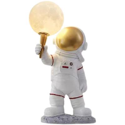 China Amazon Moon energy-saving lamp astronaut space kids room deco post-modern minimalist creative table lamp for sale