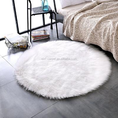 China Anti-slip Cream White Color Bedroom Decorate Roundness Artificial Sheepskin Floor Carpets for sale