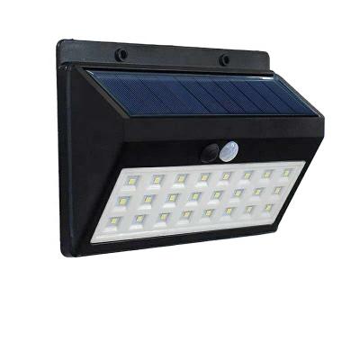 China Garden Jiexuan Super Bright 24led Three Control Modes Waterproof Outdoor Solar Powered Motion Sensor Security Garden Wall Lights Lamp for sale