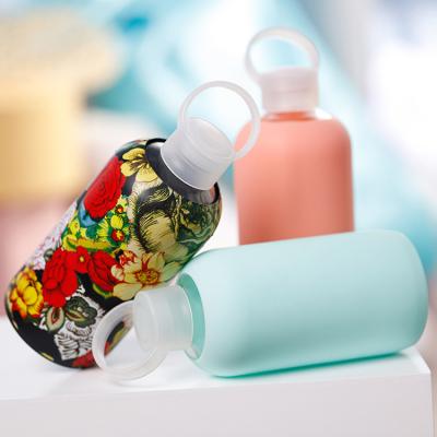 China Viable Wholesale Glass Water Bottles 500Ml Juice Reusable Glass Water Bottle With Silicone Sleeve for sale