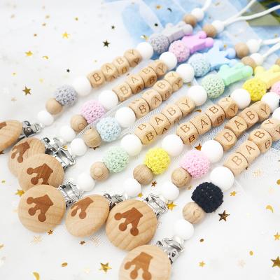 China BPA Free Wholesale Dummy Pacifier Clips Beads Baby Toys Silicones Pacifier Clip Handmade Wooden Infant Baby Pacifier Clip Holder for sale